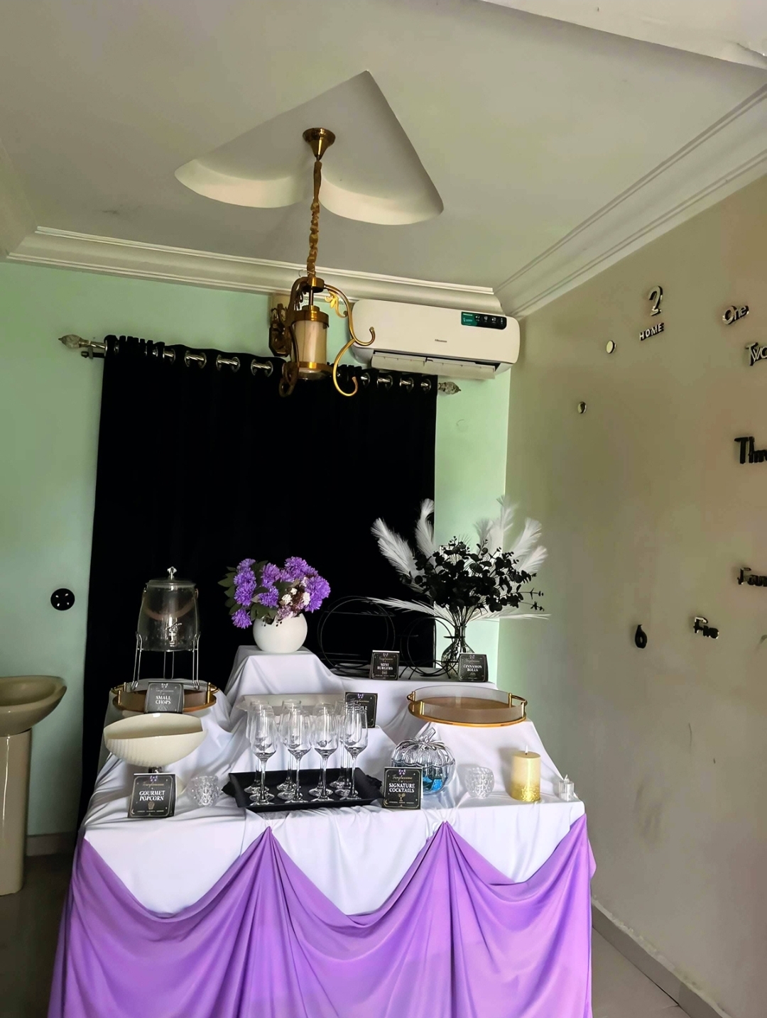 Tessyluscious catering table setup with drinks and desserts